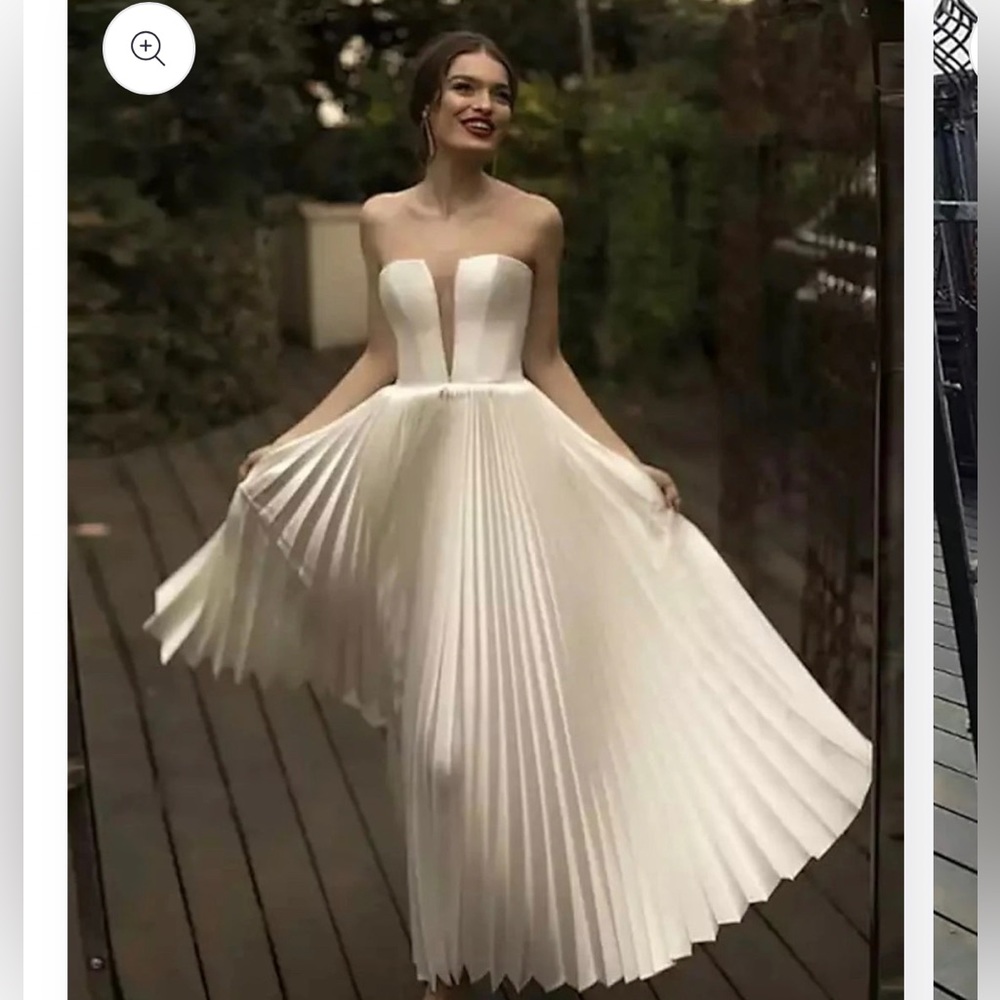 Strapless ivory dress!  Fanned bottom!